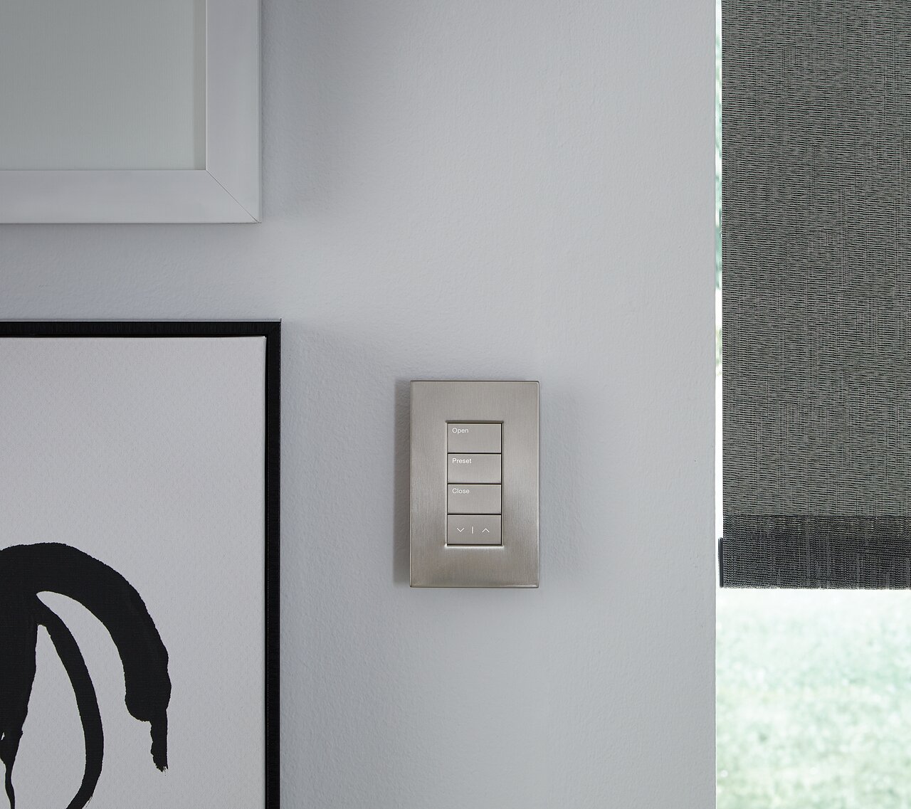 Lutron 4-button keypad in satin nickel in a dining-room application
