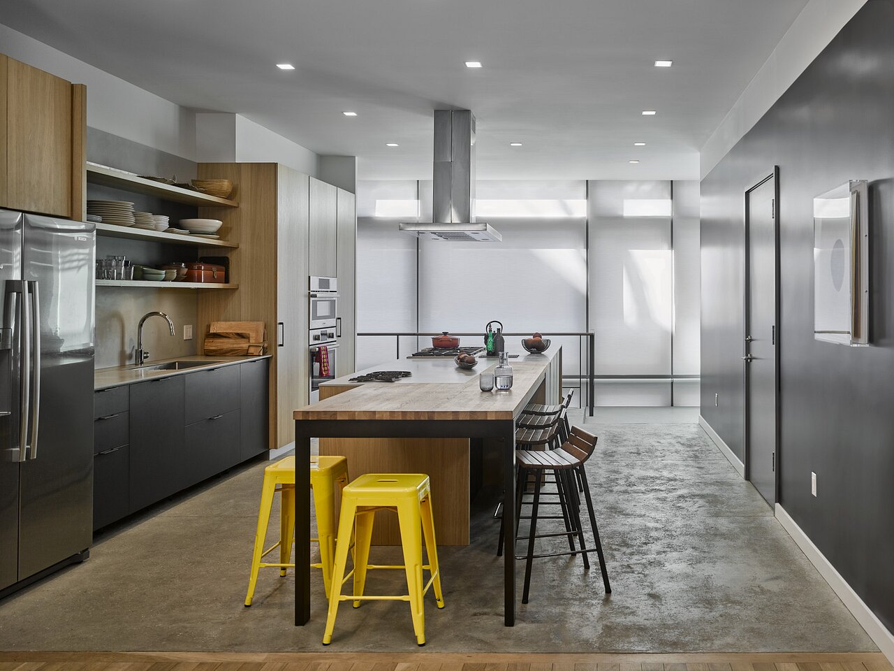 Same kitchen with Lutron shades fully closed for evening privacy